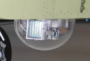 External view of low light surveillance system installed on an aircraft.